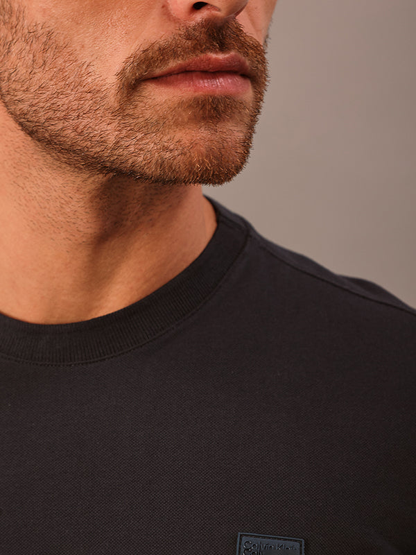 CAMISETA CALVIN KLEINK MASCULINA PIQUET PATCH BORRACHA